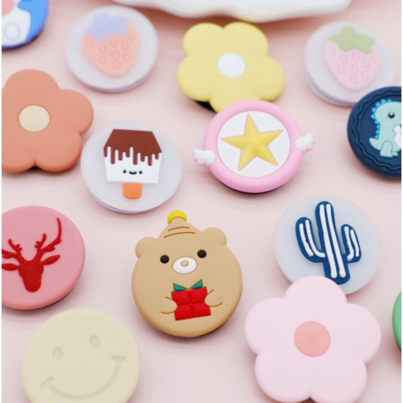 Product Introduction of (Giveaway) 1 cartoon bear silicone phone holder Sticky desktop phone holder Soft silicone folding phone grip 1