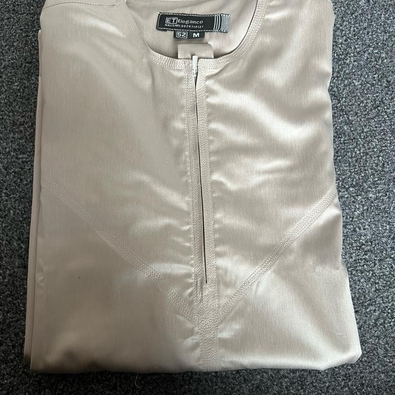 Omani round neck shiny thobe 1