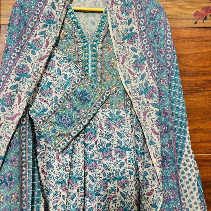 Premium cotton anarkali suit with beaded design at the front. 1