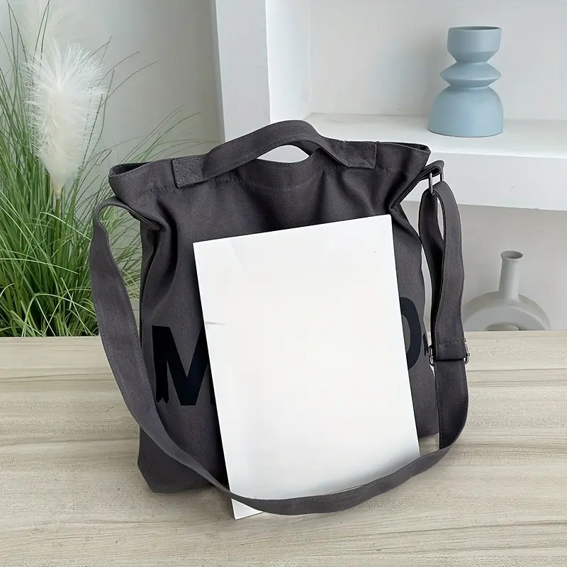 Large Capacity Multifunctional Tote Travel Messenger Bag Made of Canvas for Women, Suitable for Crossbody Use. 5