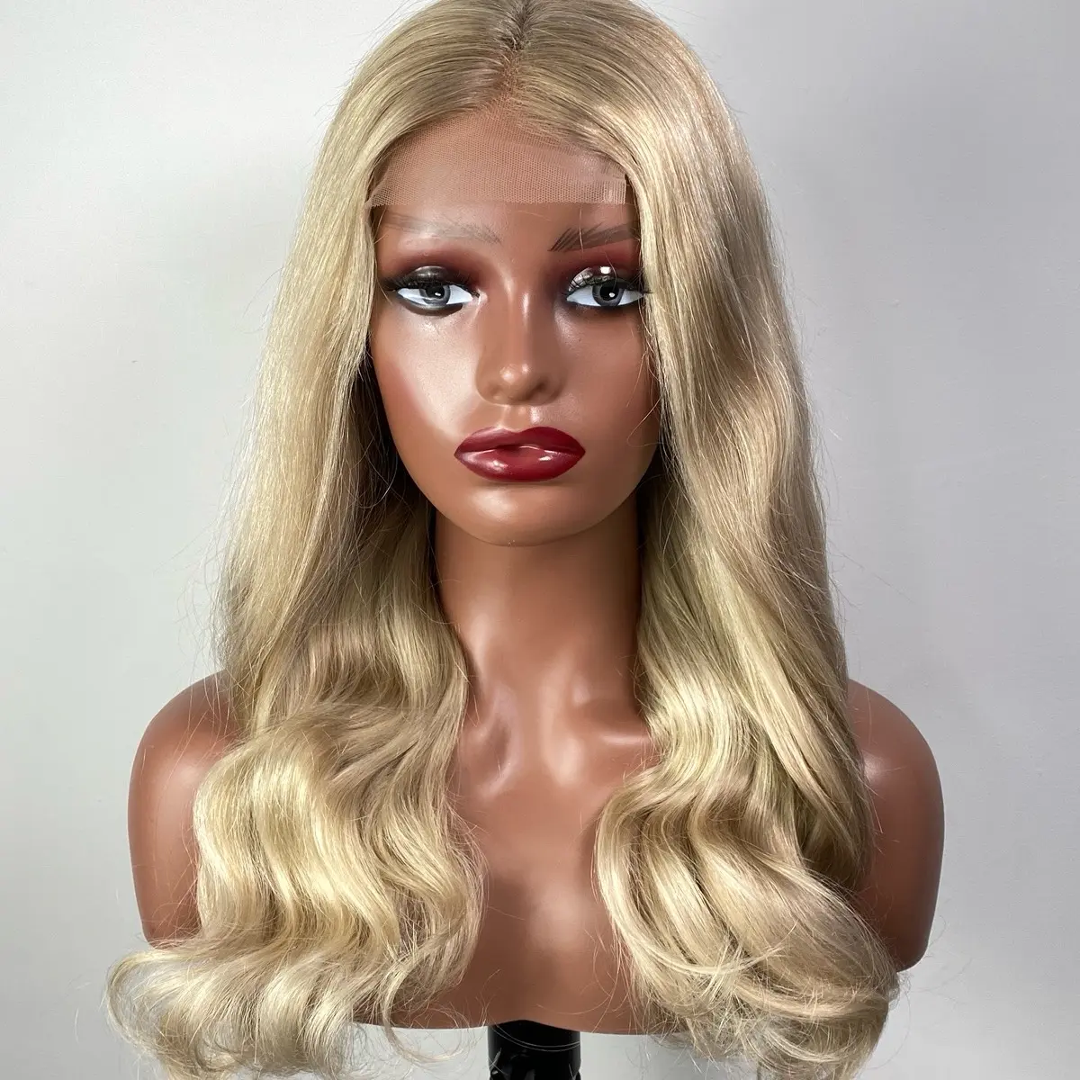 100% human hair, 18 inches 4x4 blonde with a touch of honey highlights, wear and go glasses wig