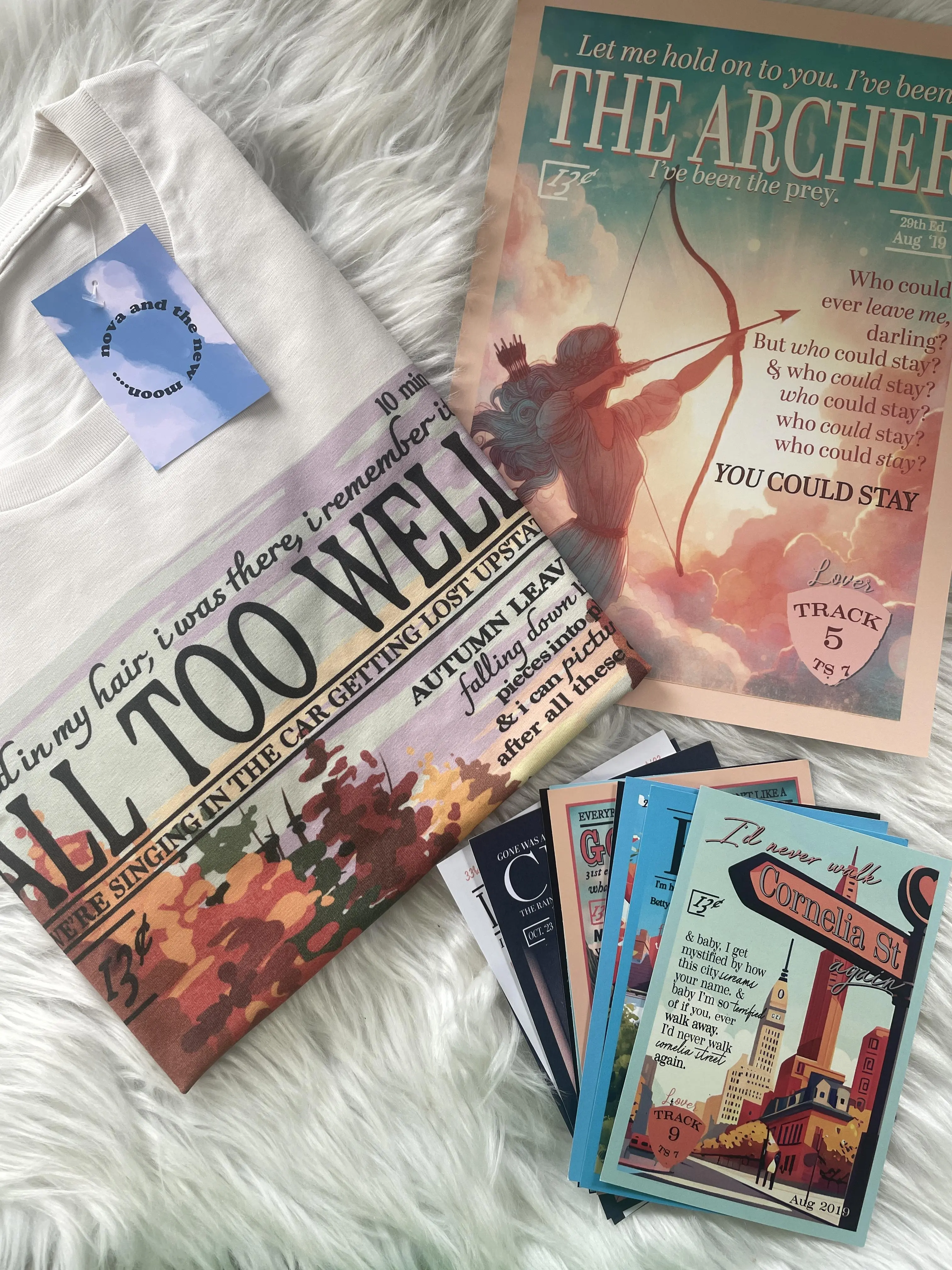 TS mystery bundle including t-shirt or sweater plus surprise print and postcards bundle