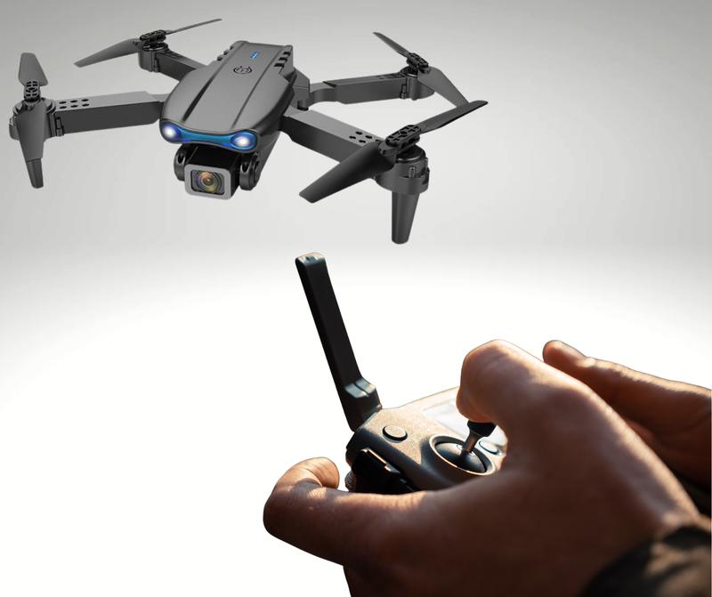 "Trendi E99 Foldable Quadcopter Drone with 360° Roll and Dual HD Lenses - Includes Cameras, Accessories, and Folding Charging Crystal Drones." 5