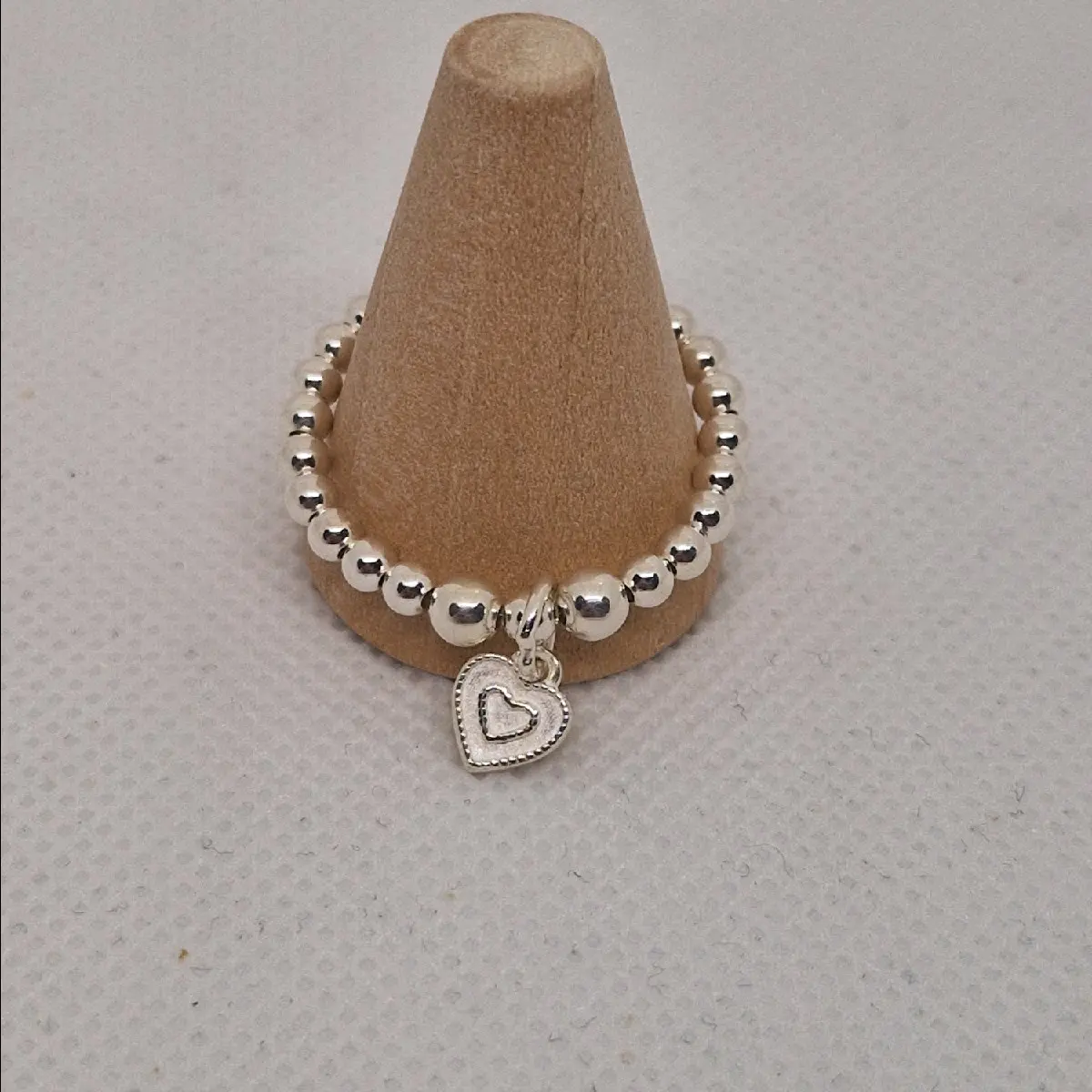 Sterling silver, heart charm elasticated ring jewelry