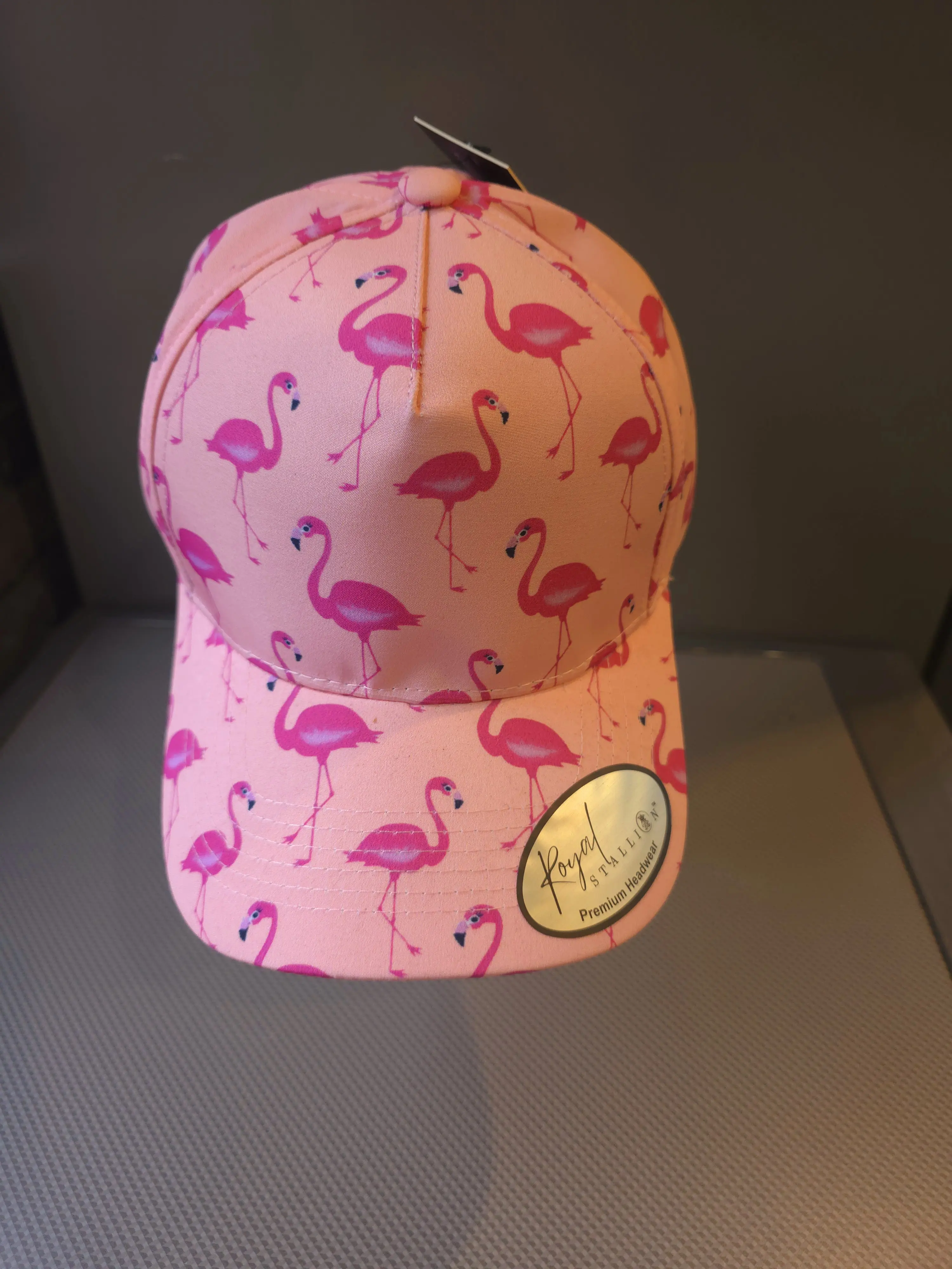 Flamingo snap back caps available in 3 different colours