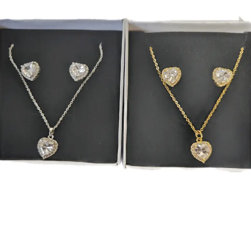women silver- and gold plated  heart stud  earring  and pendant set 1