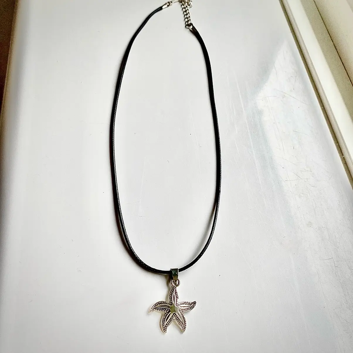 Enchanting Women's Necklace with Silver Starfish on Black Rope Chain