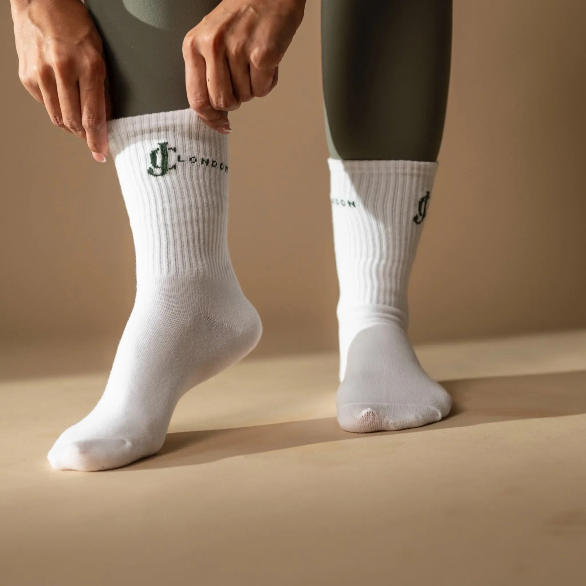 Womens white socks green logo