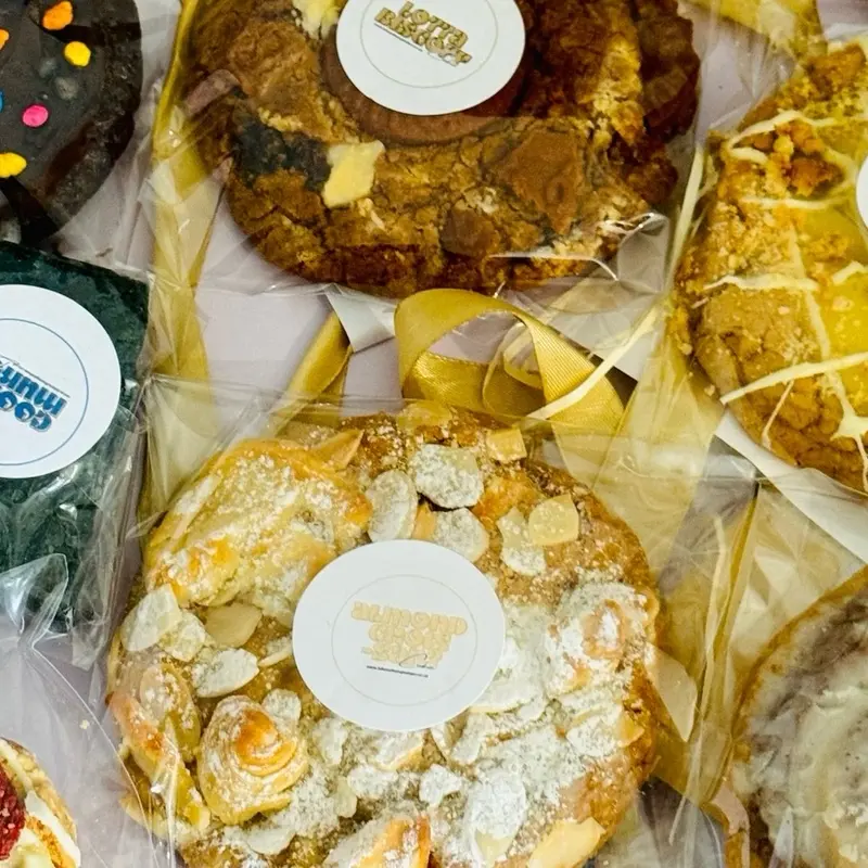The Almond Croissant (STUFFED) Cookie by Bites of Temptation (DESSERT SIZE Snack) | Almond-Based Cookie with Home Baked Croissant Pieces, Cream Cheese Filling, White Chocolate Chunks & Powdered Sugar Dusting | Halal Suitable cookies 1