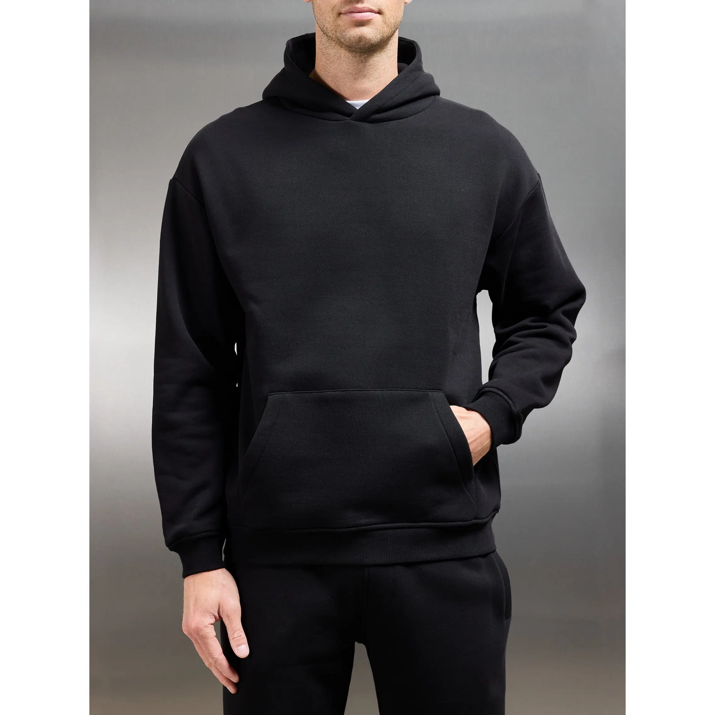 Essential Relaxed Hoodie in Black