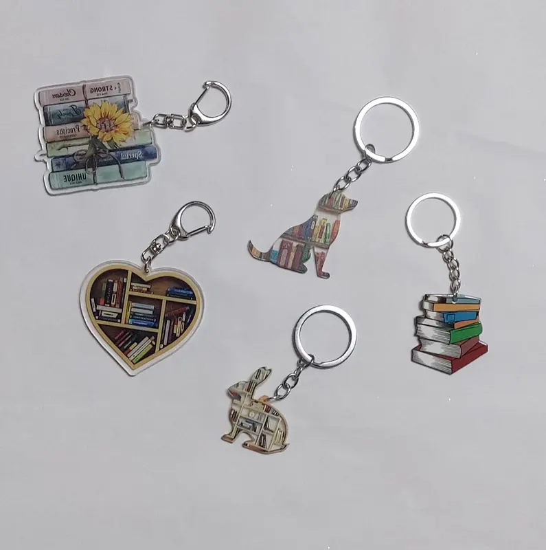 Mystery Box with 5 Items: Book, Bookmark, Keychain, Pens, and Socks 3