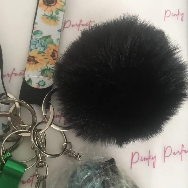 Pinky Perfect UK Legal Green Sunflower Key Chain Set with 3-in-1 Stylus, Door Opener, Bottle Opener, Whistle, Personal Alarm, Light, Wristlet, Sanitiser Pouch, Bottle, Lip Balm Holder, Pom Pom and Car Escape Tool 6