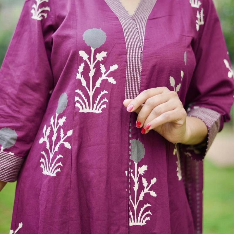 A line kurta set with embroidered work on neck and sleeve. pakistani outfits 4