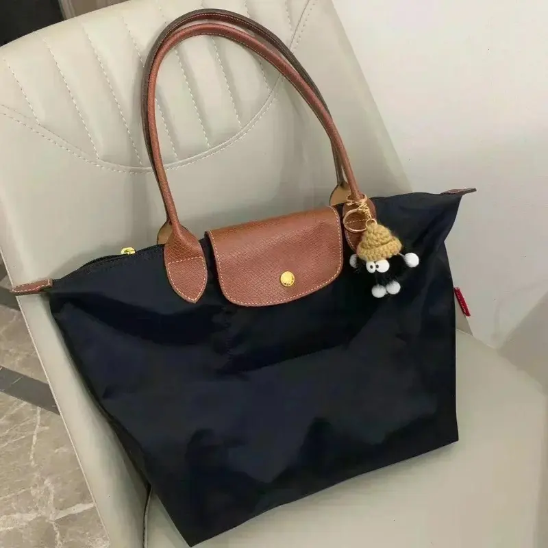 Product Introduction of Women Folding Designer Fashion Casual Shoulder Bag High Quality Nylon Handbags Sac Large Capacity Classic Tote Bag New 8