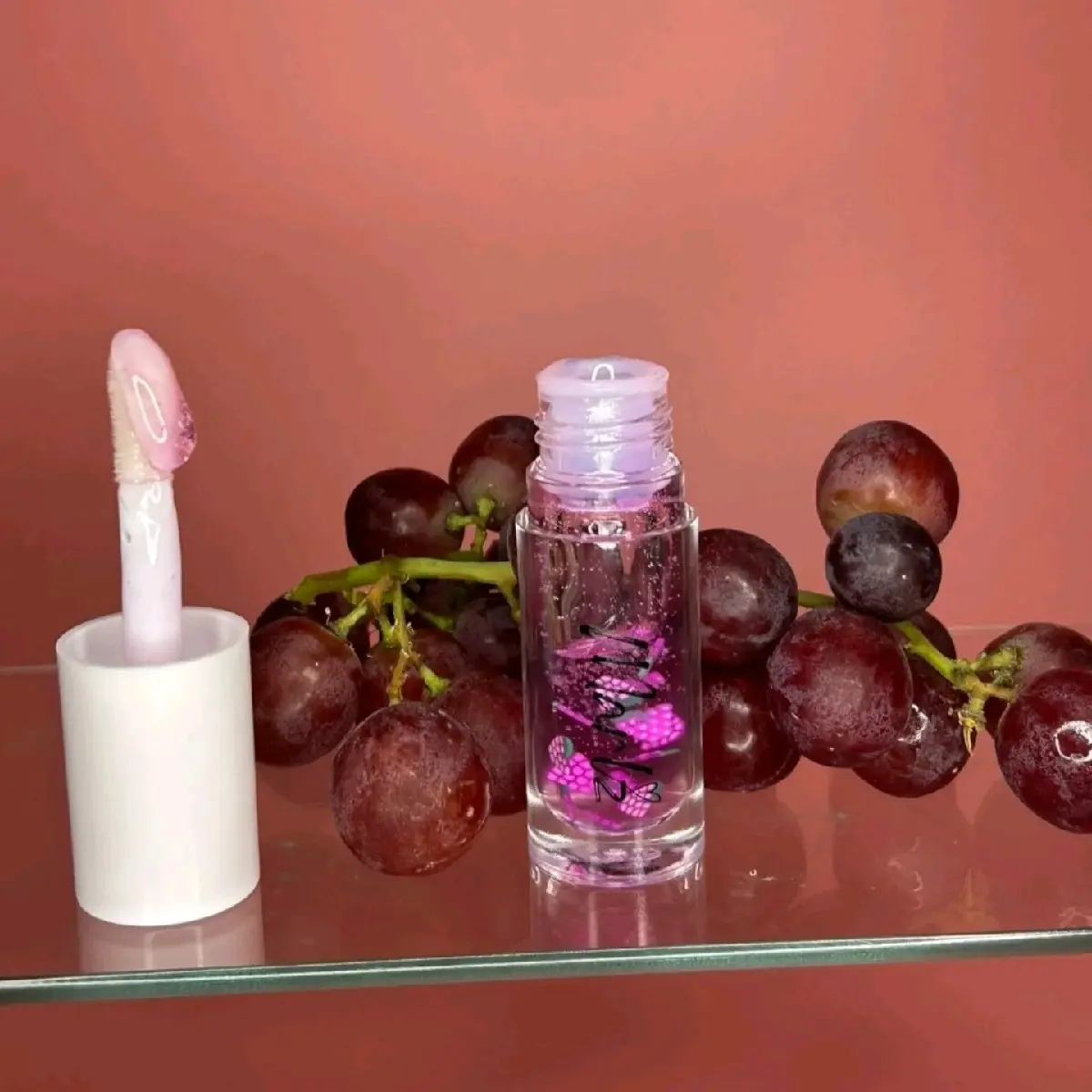 Grape Lip Oil with Fruit Pieces for skincare