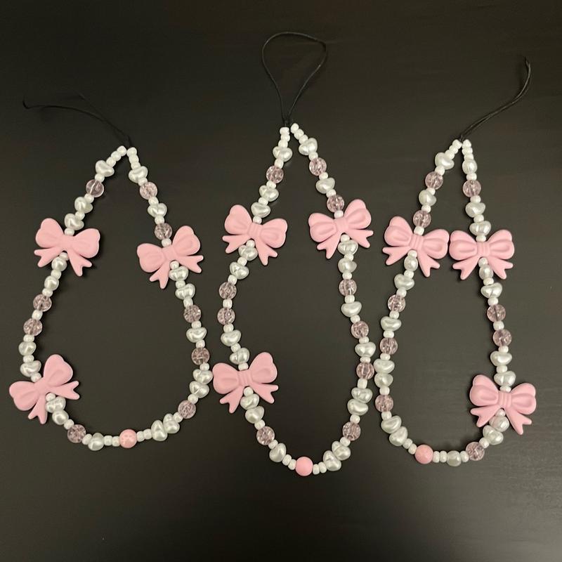 Pink crystal + bow phone charm 6