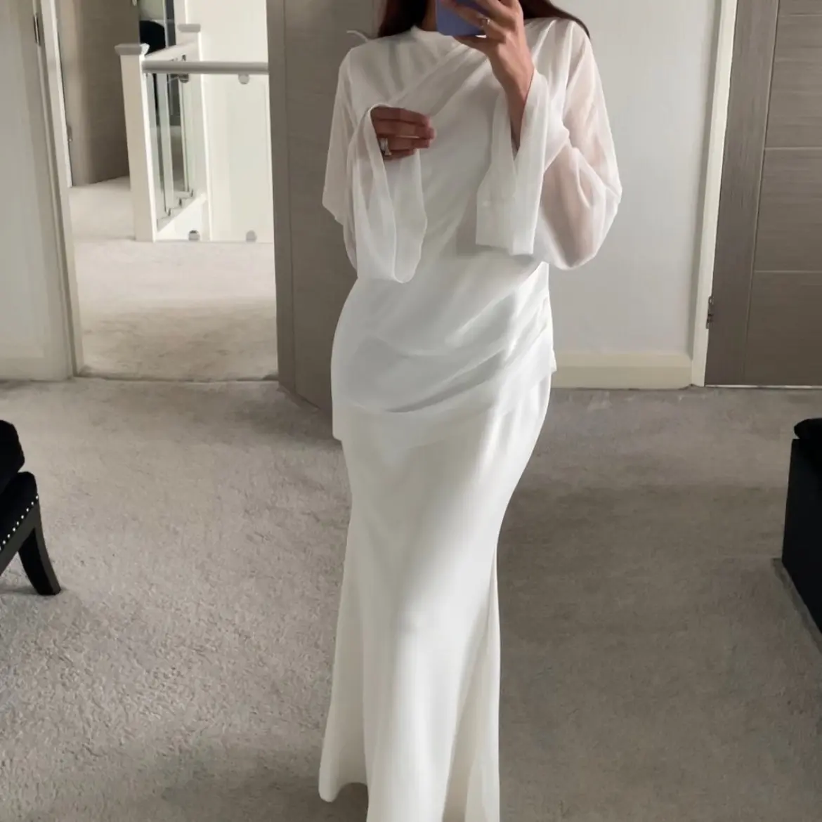 SHESOUT in the classic white mesh drape dress