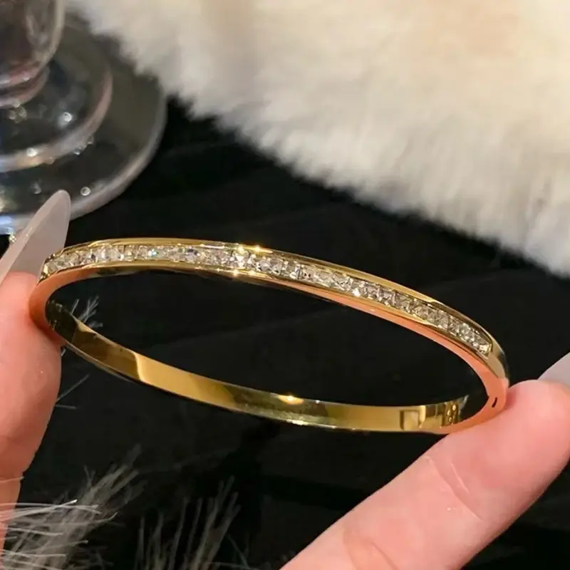 kia Bangle gold and diamante detail womans 1