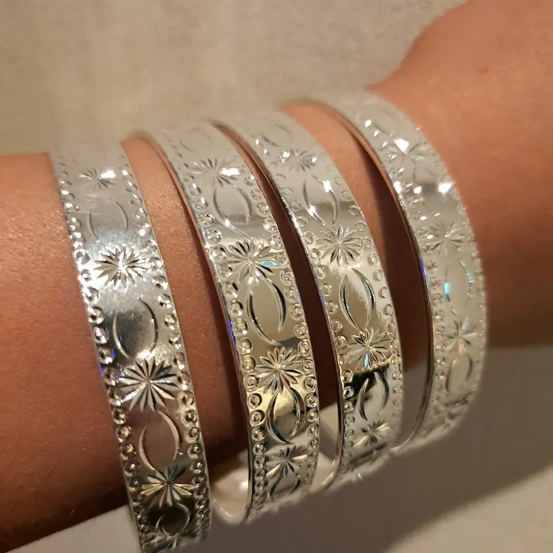 star burst stacking bangles medium width set of 4 gold or silver plated available stainless Steel. 7