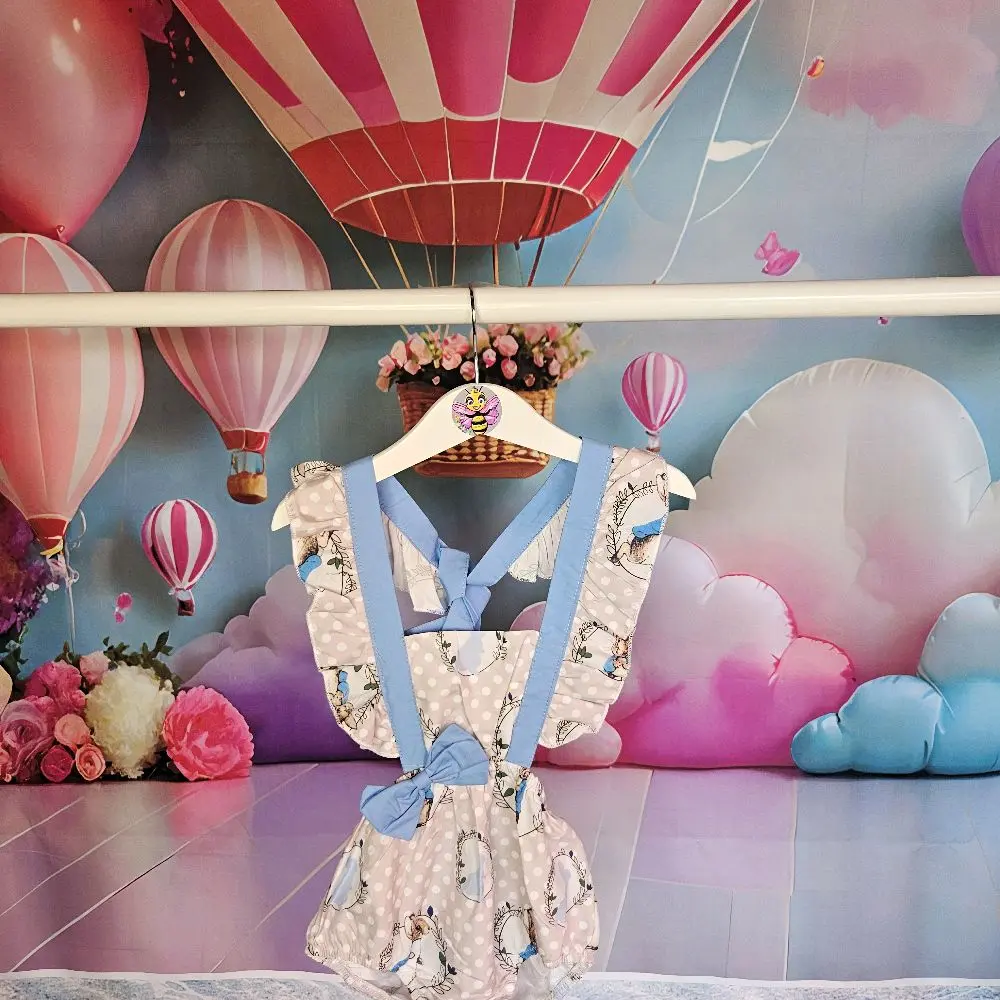 Bunny Romper with Blue Ribbon
