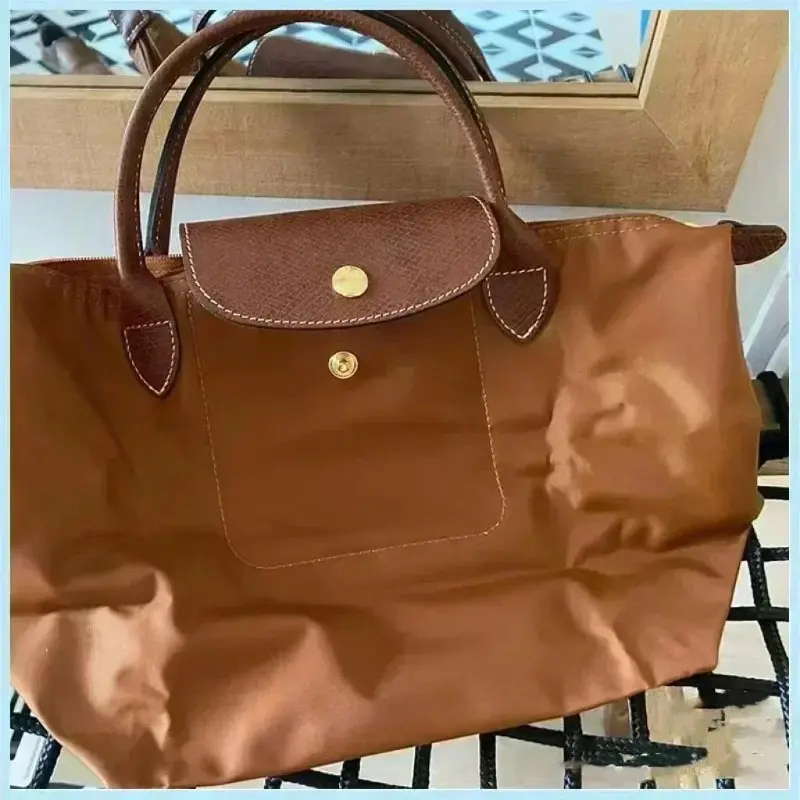 Product Introduction of Women Folding Designer Fashion Casual Shoulder Bag High Quality Nylon Handbags Sac Large Capacity Classic Tote Bag New 7