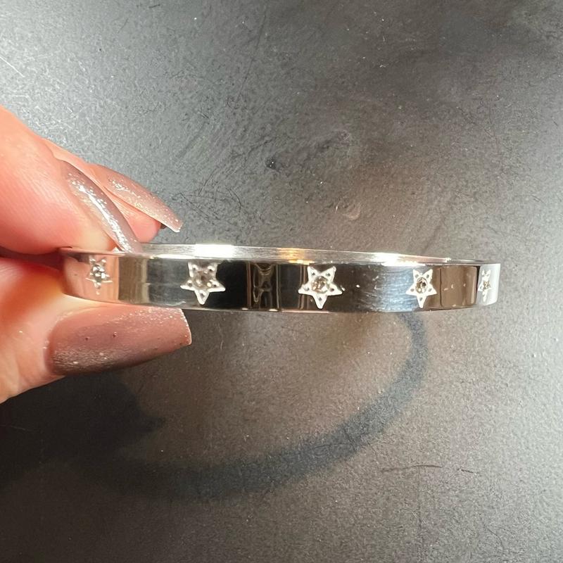 Kia star bracelet available in silver and gold. Diamanté star detail 8