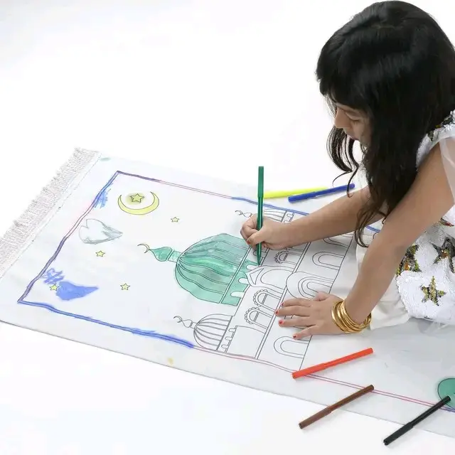 Colouring Prayer Mat set includes prayer mat, fabric coloured pencils, and a box. 1