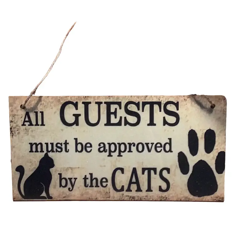 Door sign All guests must be approved by the cats 0