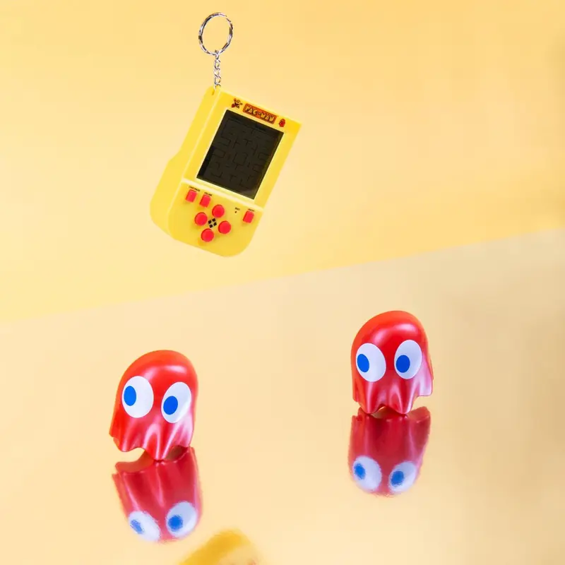 Pac-Man Keychain Game. Mini Arcade Game LCD Screen Directional Controls. Original PAC-MAN Gameplay & Sounds. 2
