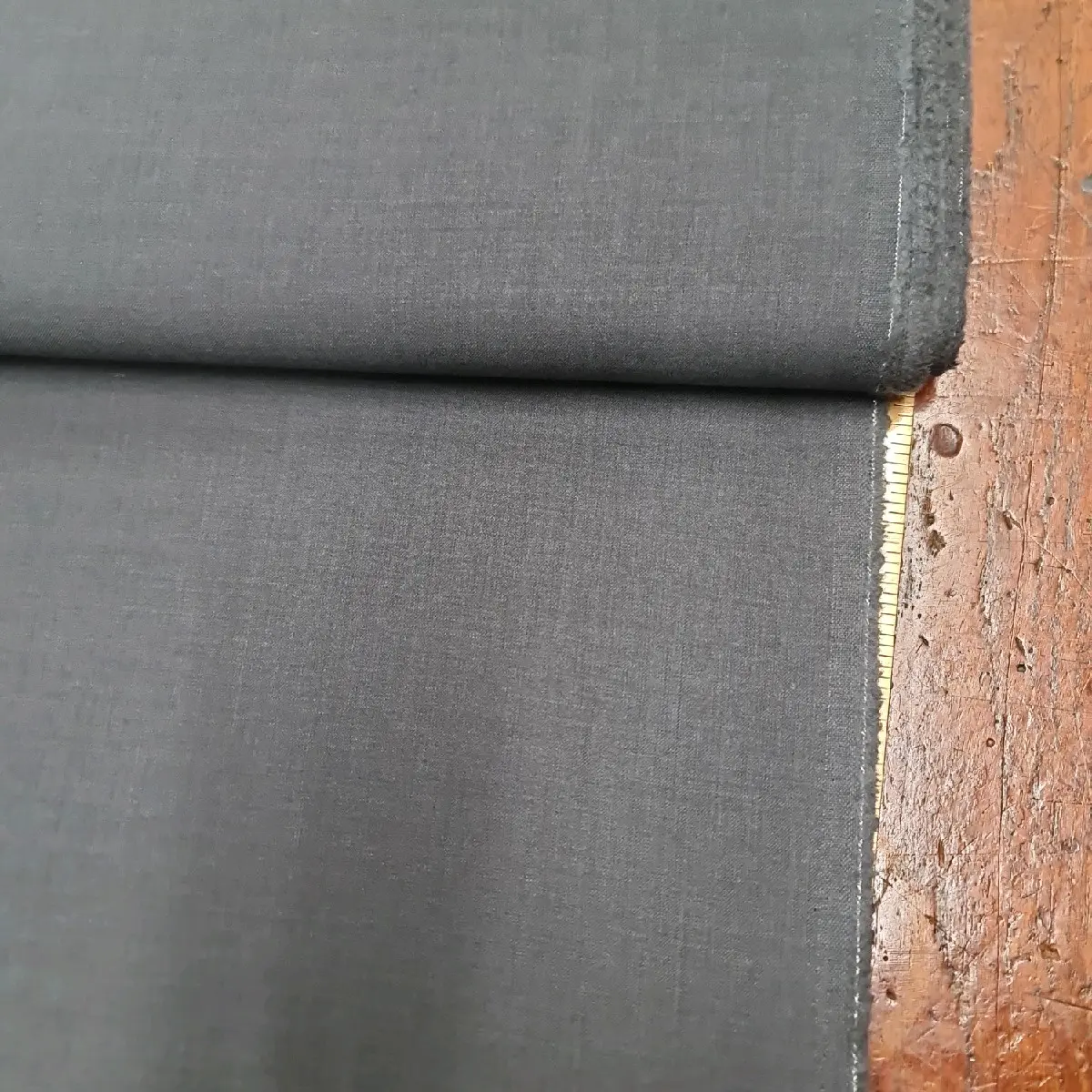 100% Wool fabric suiting 60inches wide colour charcoal grey £20 per metre