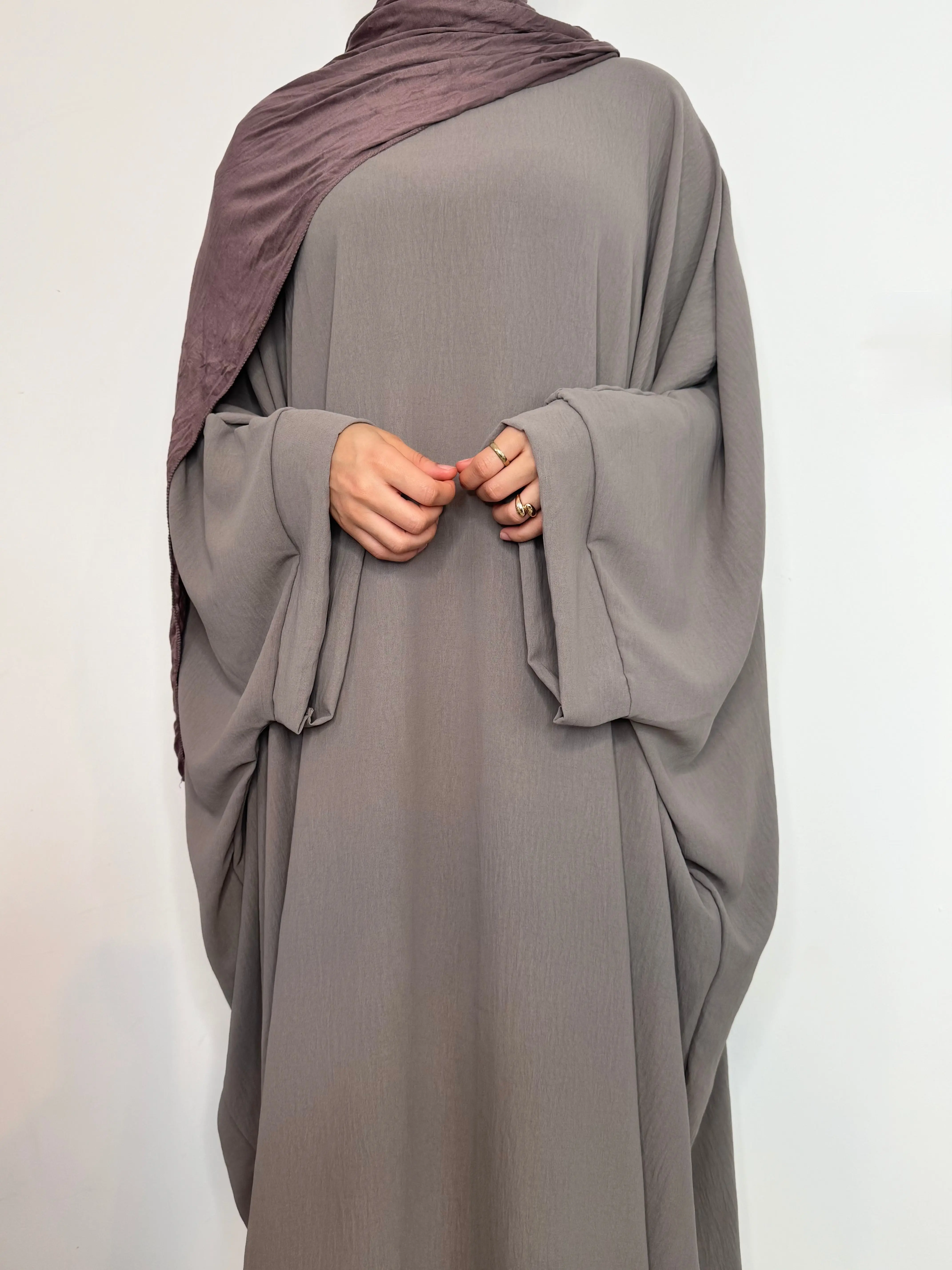 Bintbladi Butterfly crepe abaya with large sleeve available in two sizes and colours