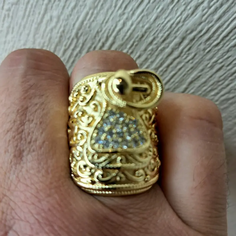 large saddle ring adjustable for size. gold plated stainless Steel. 3