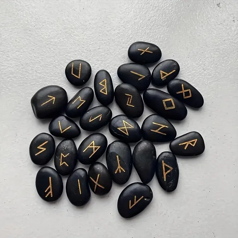 A Set of 25 Natural Black Pebbles Engraved with Ancient Letters, Accompanied by a Bag 2