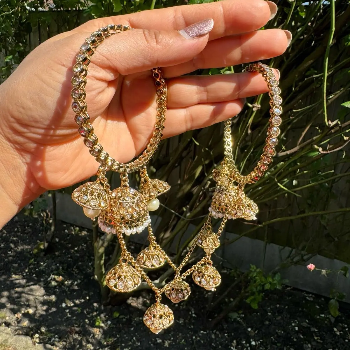 Attached multiple jhumki bangels