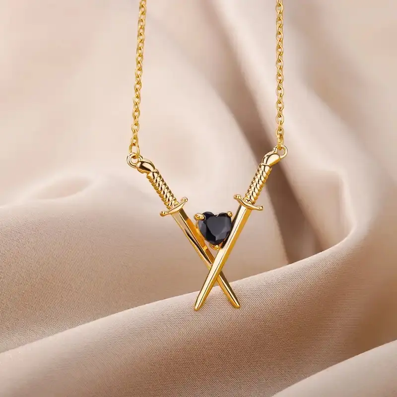 Sword With Black Crystal Heart Necklace In Gold Or Silver Finish, Crossed Over Sword With Heart Design Necklace, Gift Necklace For Her 1