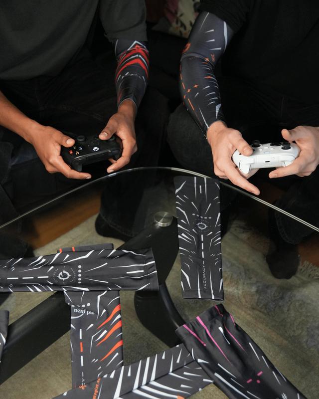 2pcs Black and Red Arm Sleeves for gaming, sports and fashion. Unisex Arm Sleeves with great slide for gaming. Compression Sleeves with UV protection perfect for all sports and gaming. Gaming Sleeves for easier glide. 4