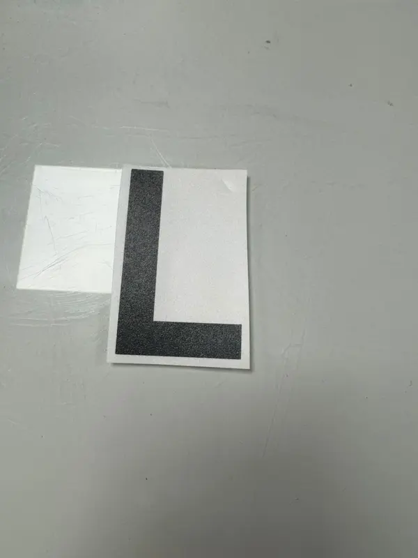 Anti Flash letters designed to disappear when exposed to camera flash 4