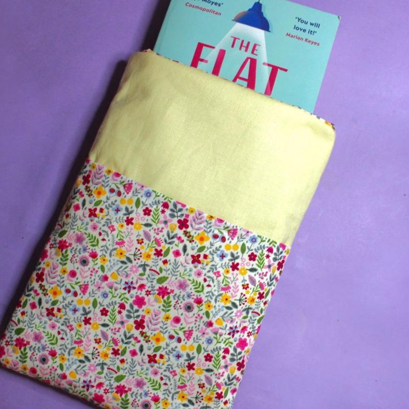 Spring Floral Book Sleeve with Yellow Contrast Fabric, Fully Lined and Padded for Protection. Pretty Wildflower Patterned Fabric on the Pocket for Storing Notebooks, Pens, etc. A Perfect Gift for any Book Lover. Kindle/Small Tablet Cover 1