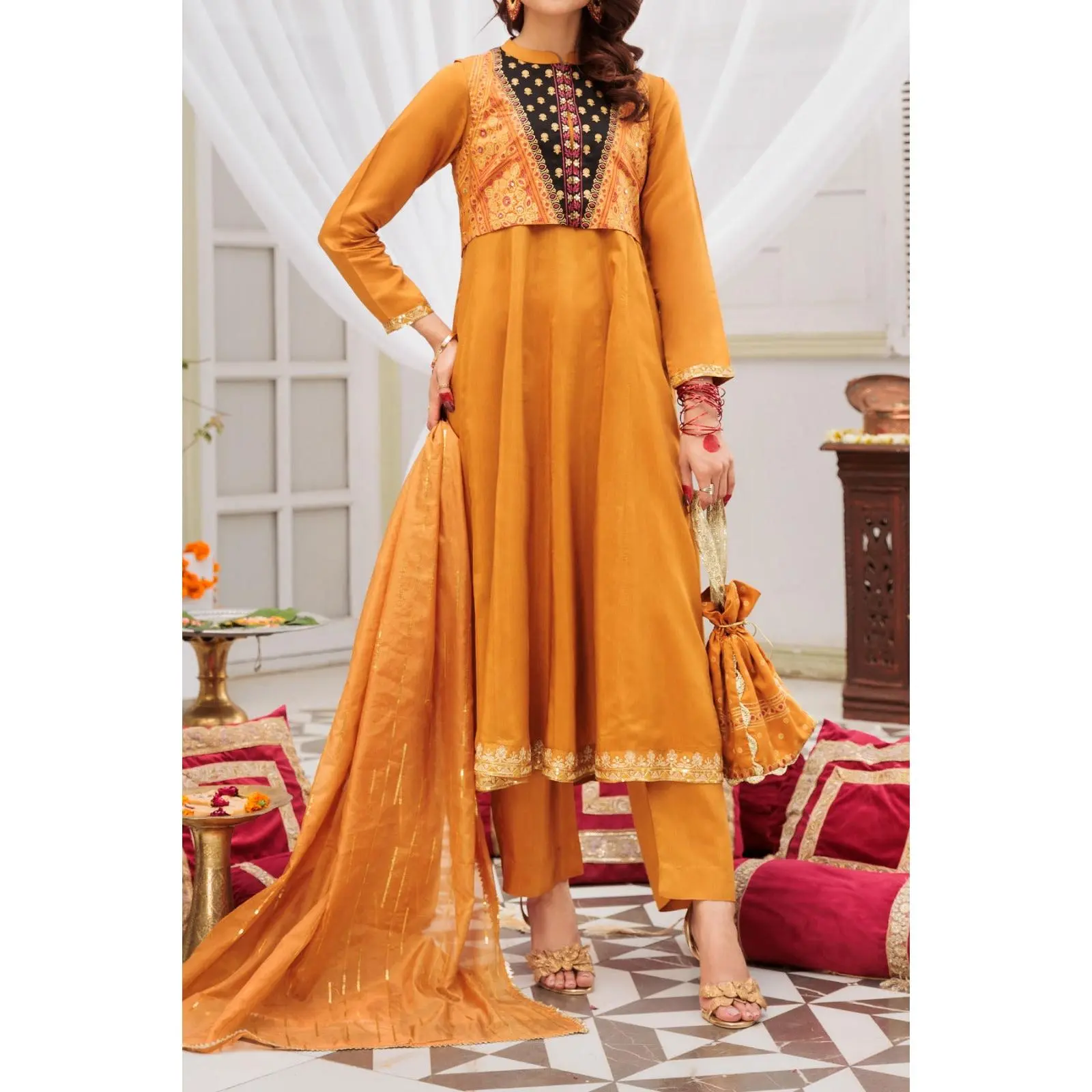 Mustard embroidered frock with screen printing and tilla work