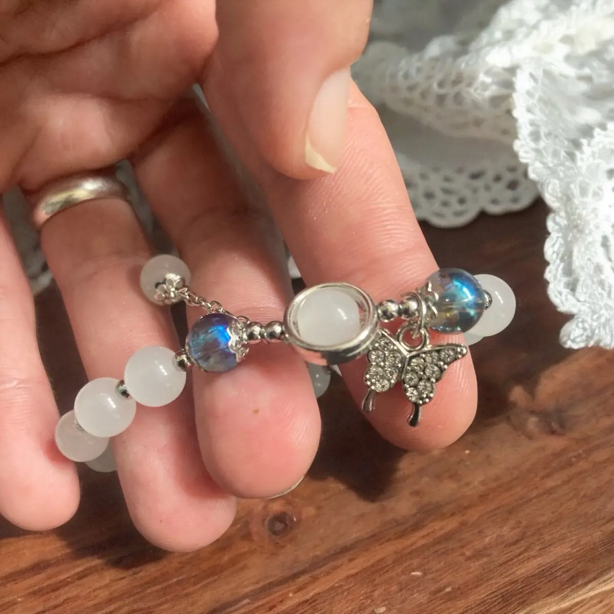 Beautiful Quartz crystal bracelet with a beautiful sparkling butterfly & a Quartz charm, free delivery & comes with a gift!