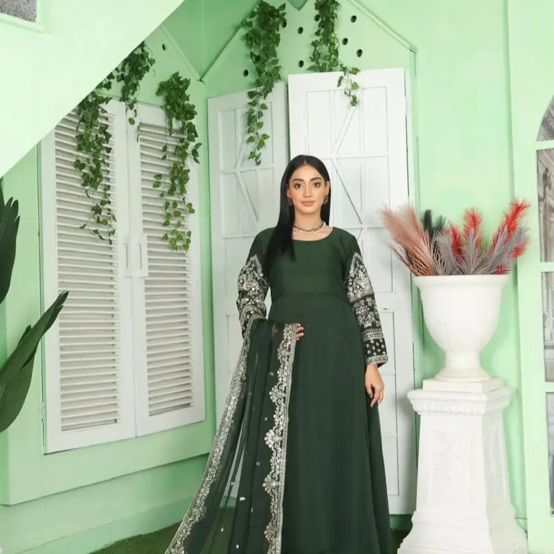 Ladies Bottle green embroidery chiffon readymade suits .