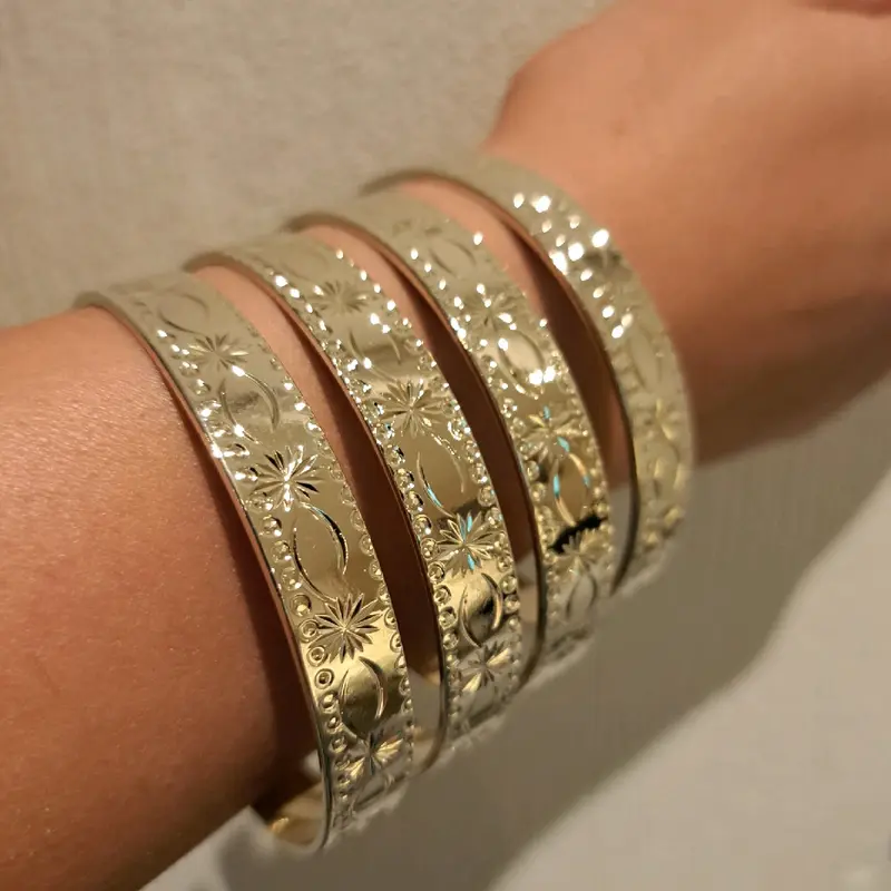 star burst stacking bangles medium width set of 4 gold or silver plated available stainless Steel. 2