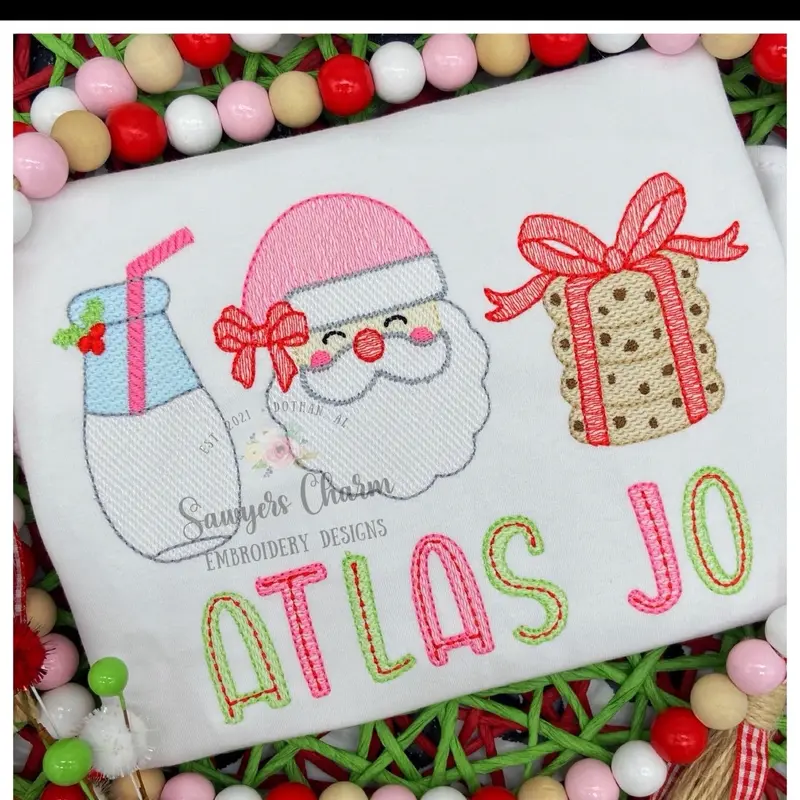 Mystery Christmas Top - 6 Designs available on embroidered T-shirts 1