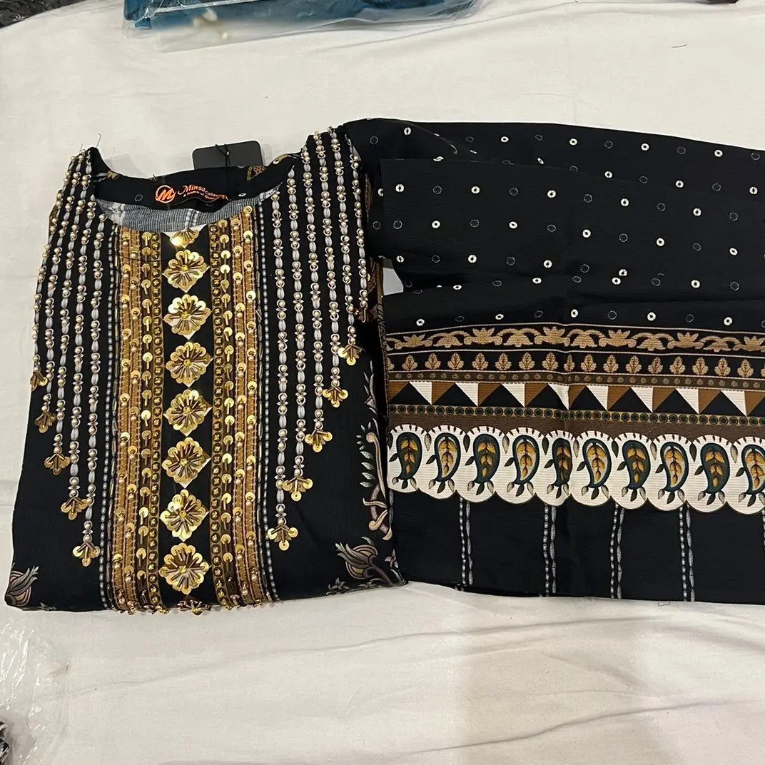 Very beautiful palazo 2pc suit with peals khaddar fabric