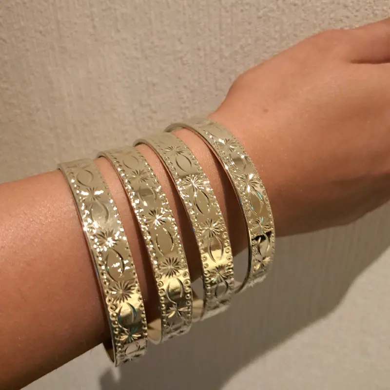star burst stacking bangles medium width set of 4 gold or silver plated available stainless Steel. 5