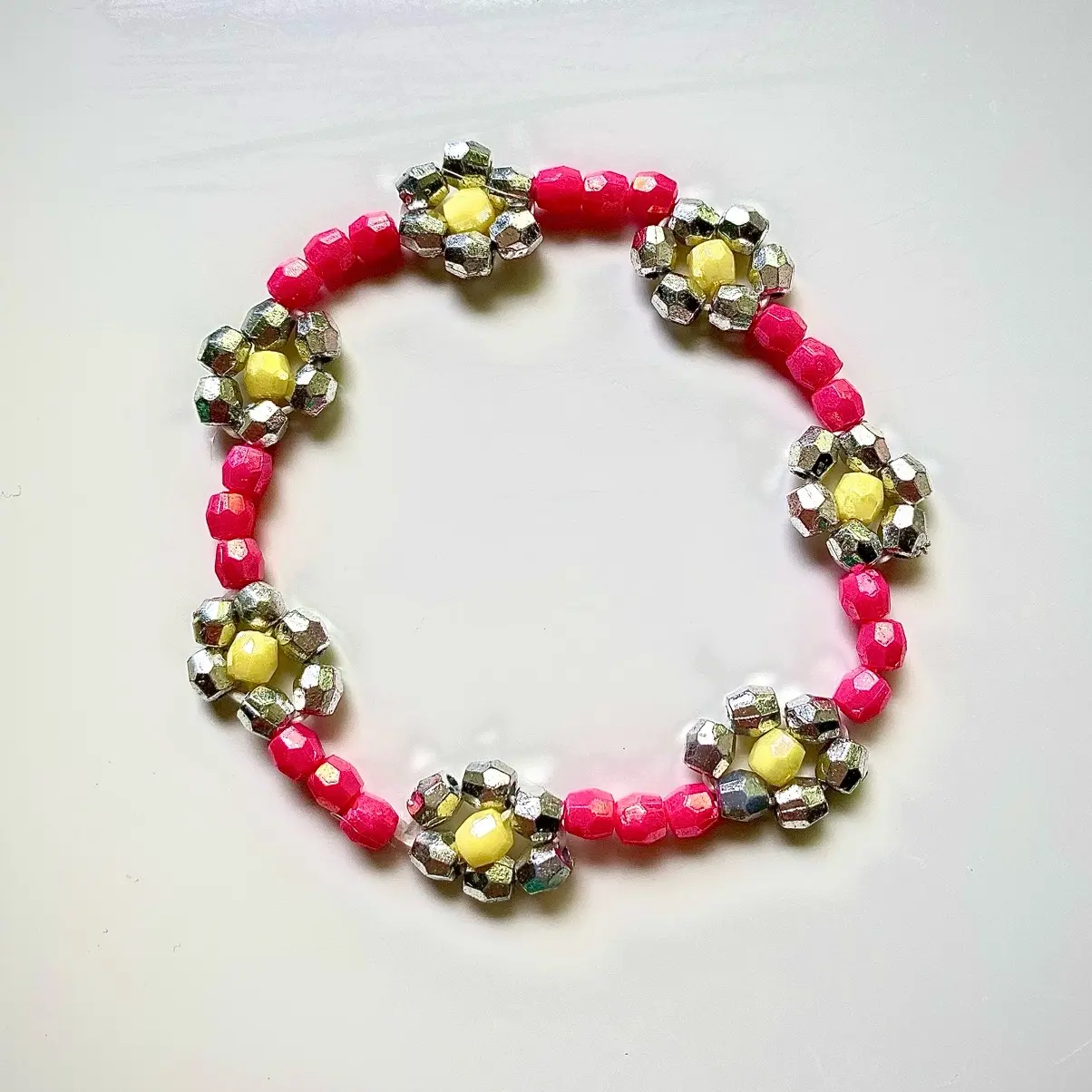 Pink with silver flowers handmade bracelet