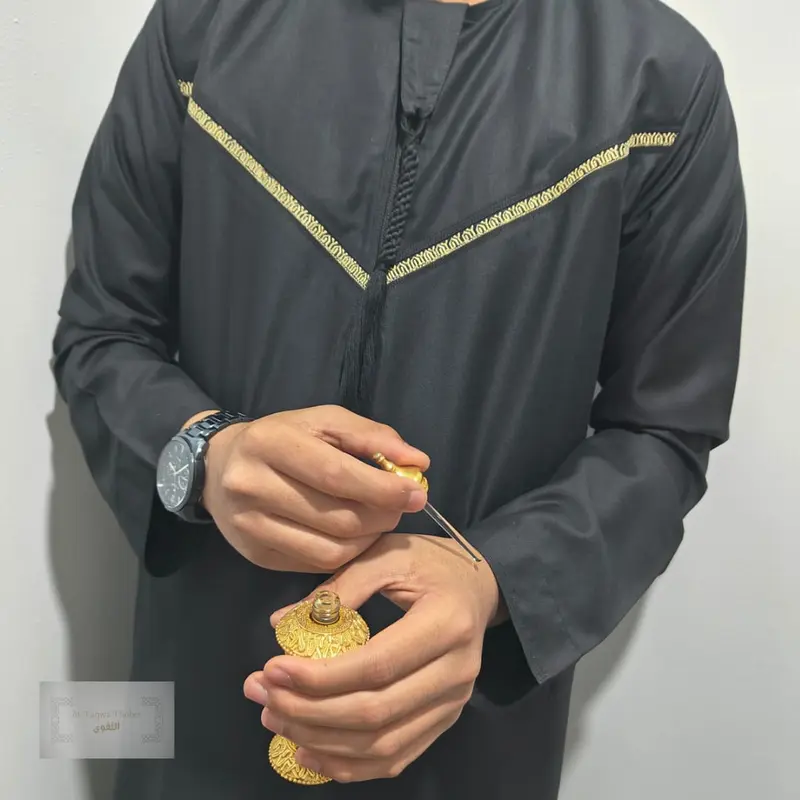 At-Taqwa Black & Gold Emirati Thobe 1