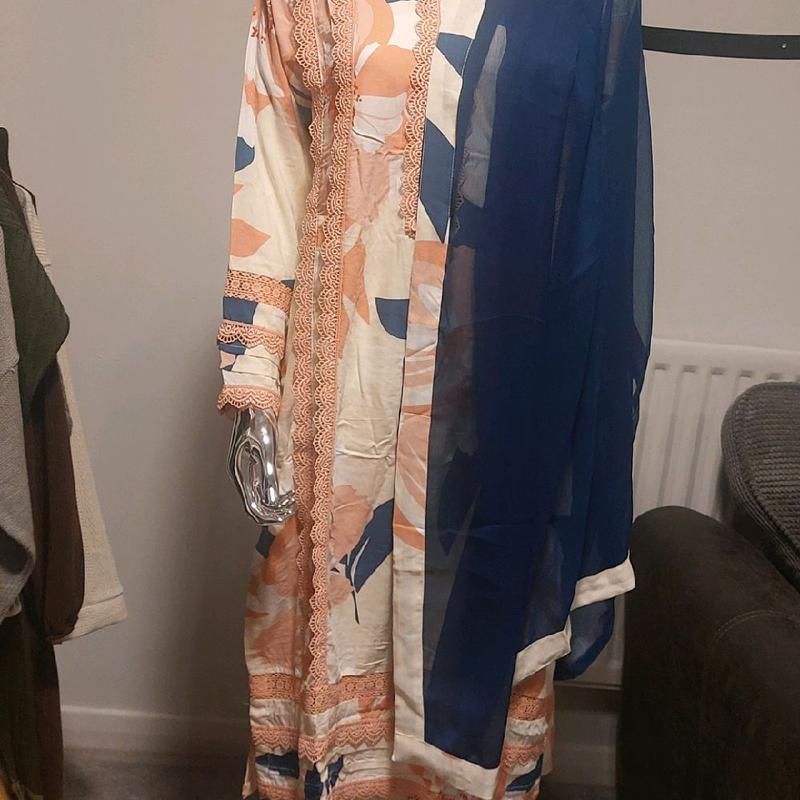 Asian Style 3pc women causal wear. boski lenen fabric and shifoon dupata ivory colour with navy blue dupata. beautiful lace work on shirt and trousers. 9